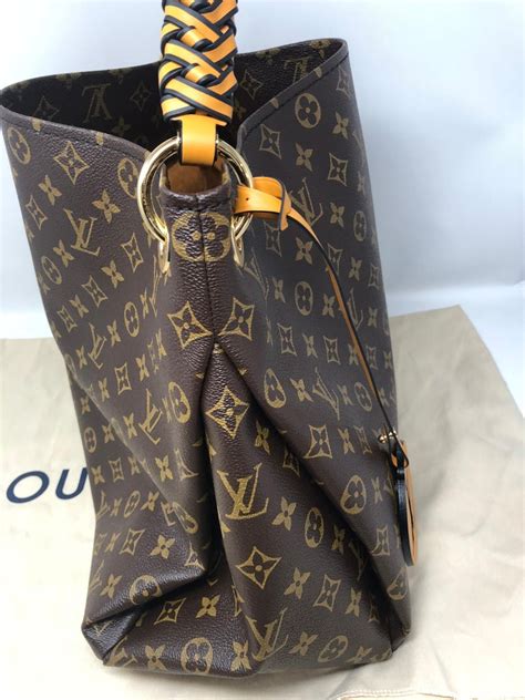 louis vuitton artsy mm large handbag braided handle|Louis Vuitton alma damier.